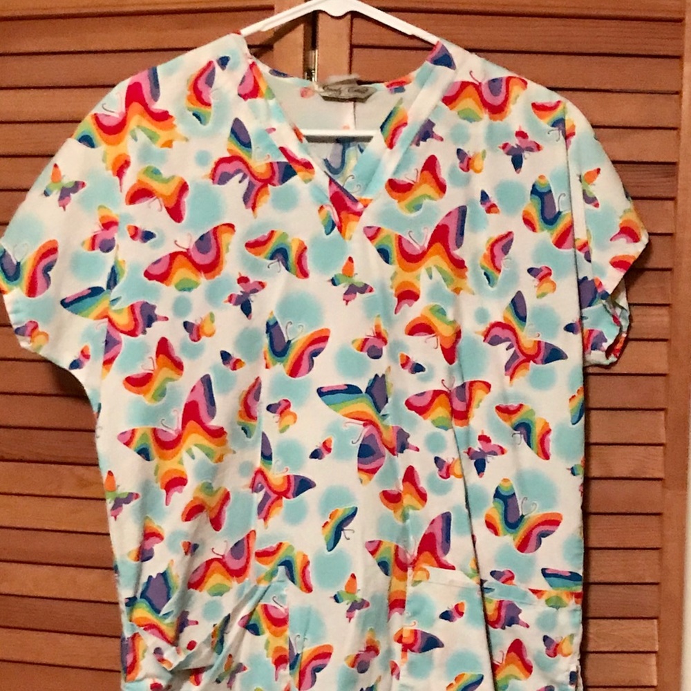Scrub top with butterflies on it.